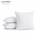 Almohadas blancas de fibra hueca siliconada apiladas
