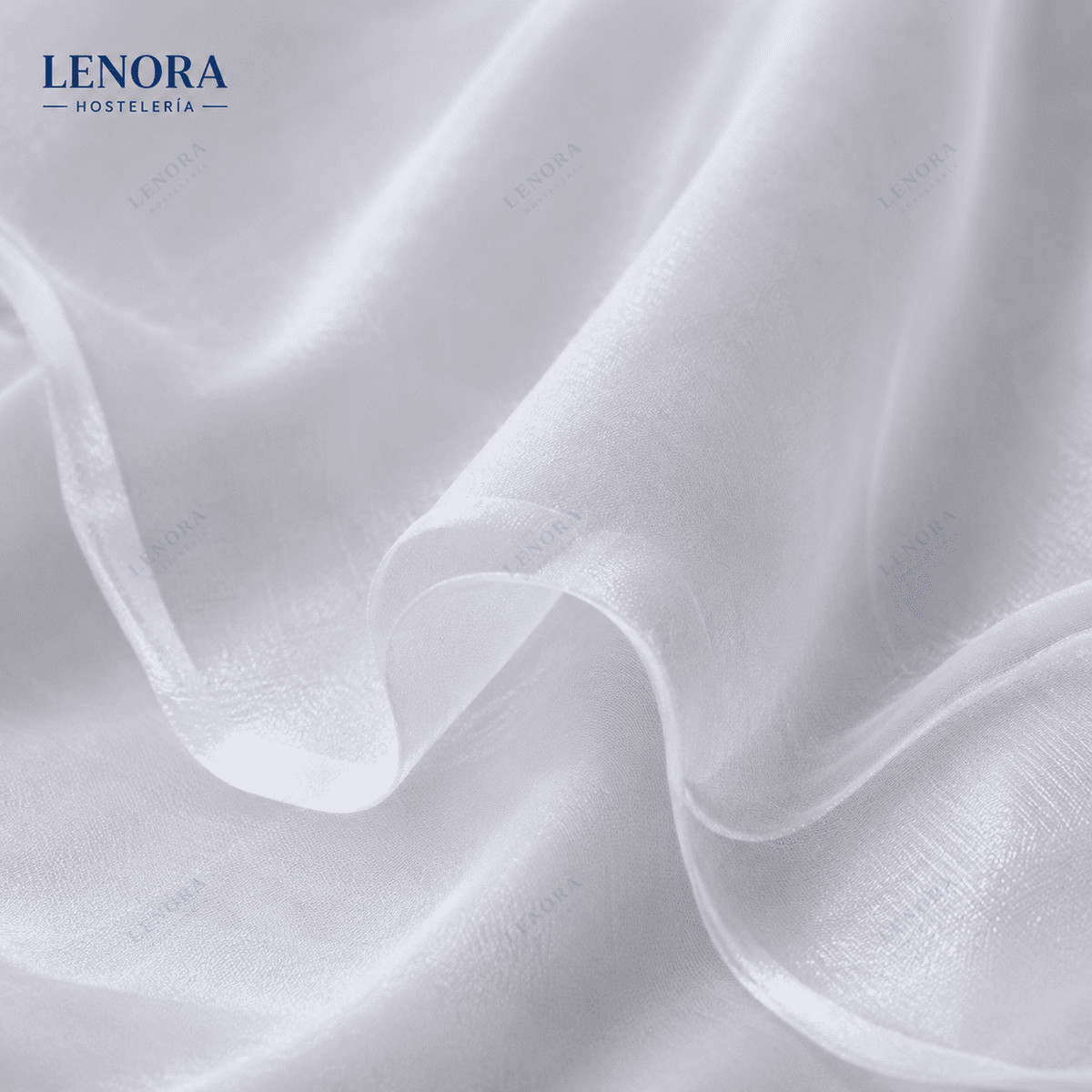 Tejido voile blanco semitransparente drapeado
