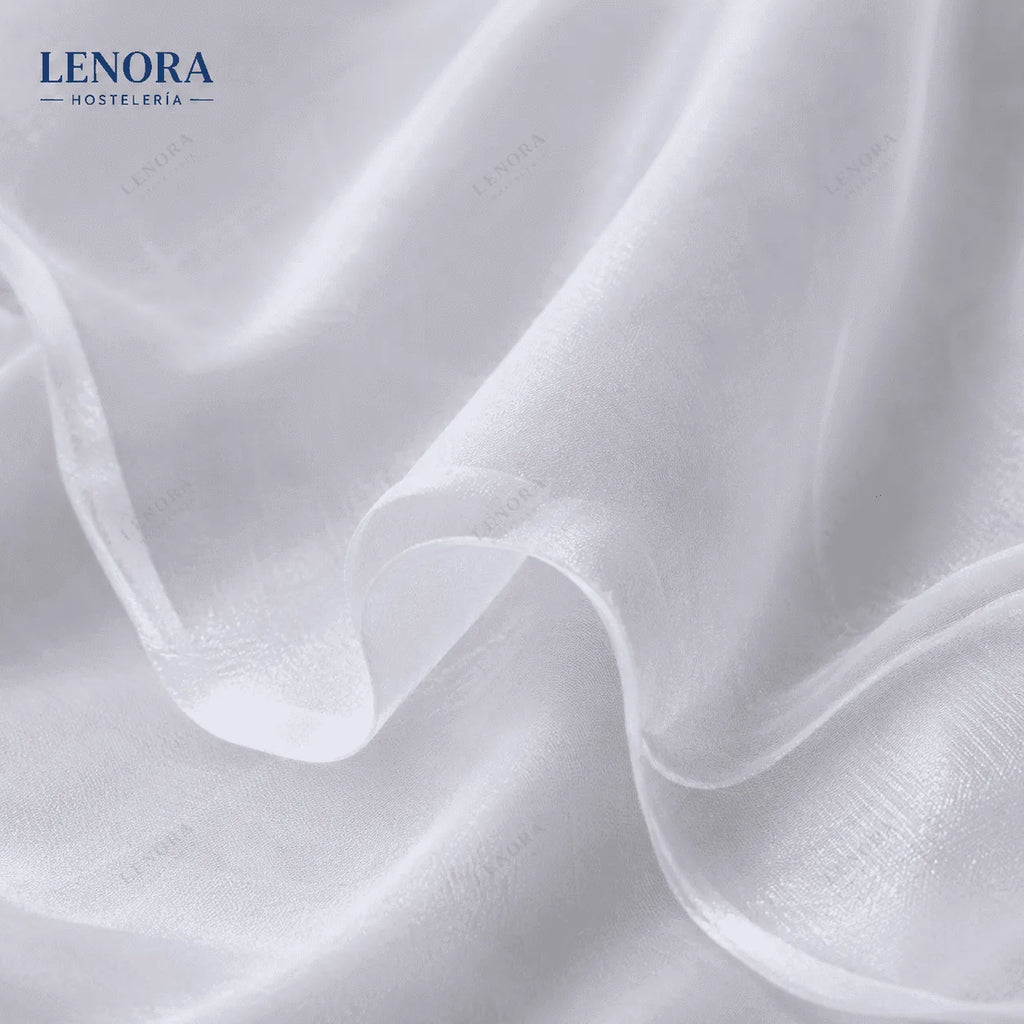 Tejido voile blanco semitransparente drapeado