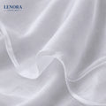 Tejido voile blanco semitransparente drapeado