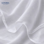 Tejido voile blanco semitransparente drapeado
