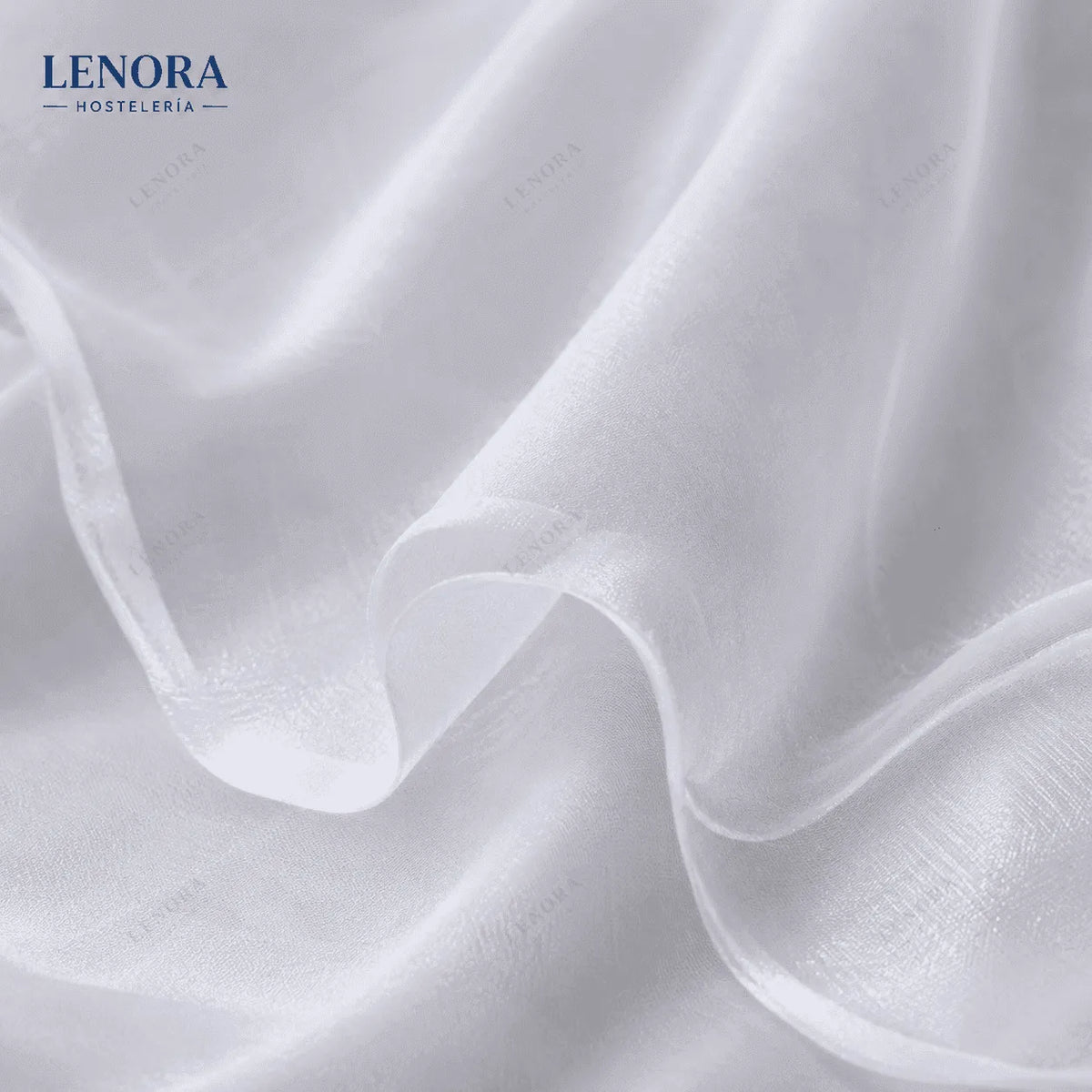 Tejido voile blanco semitransparente drapeado
