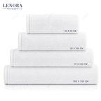 Toallas lisas blancas apiladas con sus medidas: 30x50, 50x100, 70x140 y 100x150 cm
