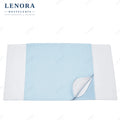 Empapador reutilizable azul con alas para protección de cama