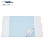 Empapador reutilizable azul con alas para protección de cama