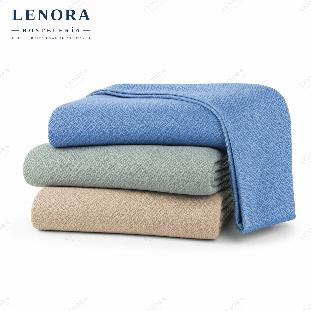 Colchas Girona dobladas en azul, verde salvia y beige